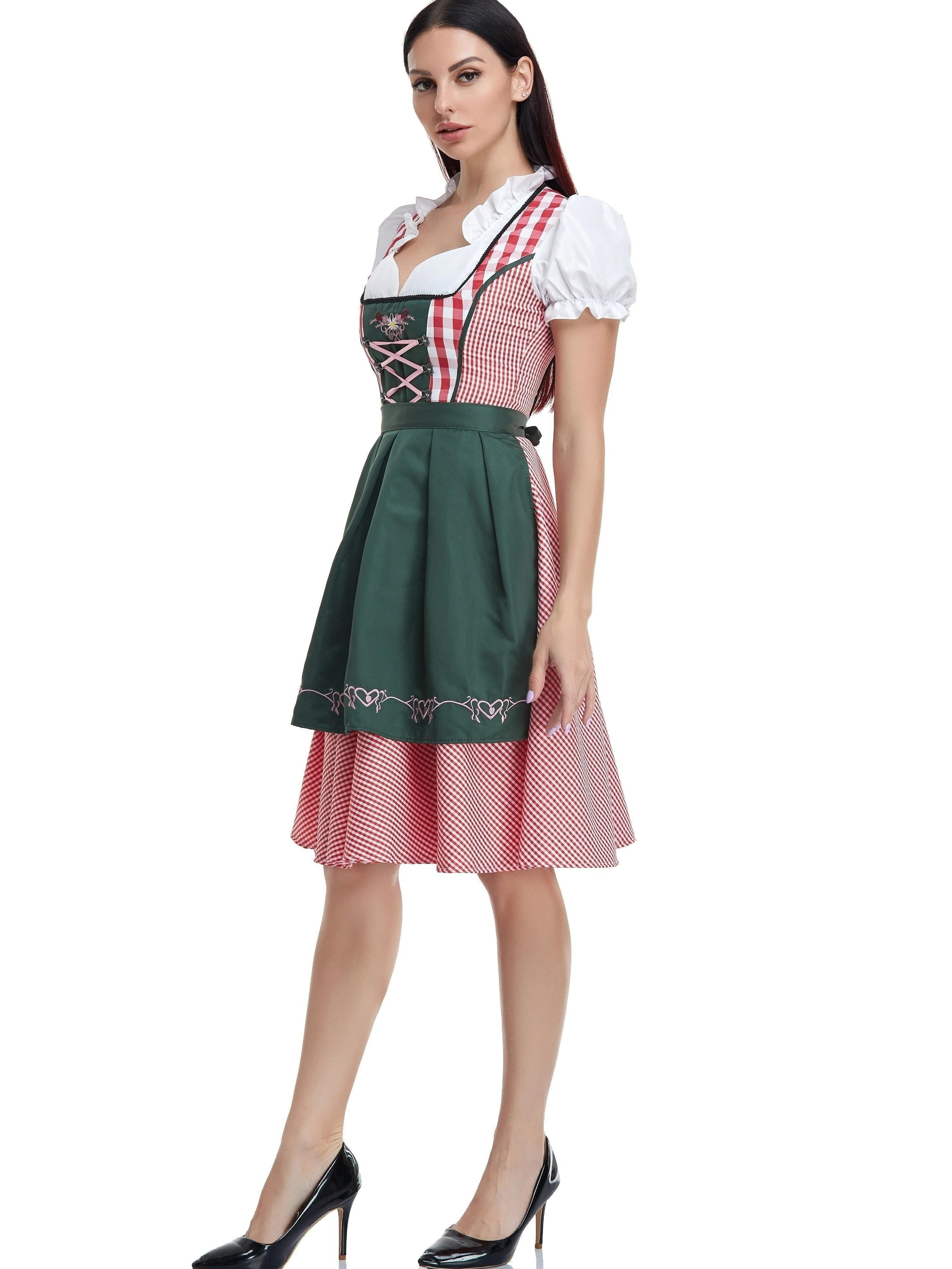 Elegant women's dirndl in olive green with a stylish apron ā perfect for traditional celebrations