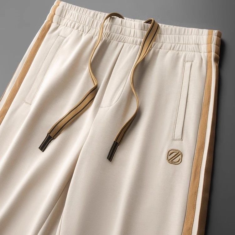 Men Tracksuit with Gold-Accented Stripes and Relaxed Fit